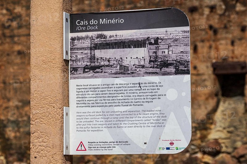 Explanatory board at the ruins of the former ore dock, Mina de Sao Domingos, historic copper open-pit mine, Portugal