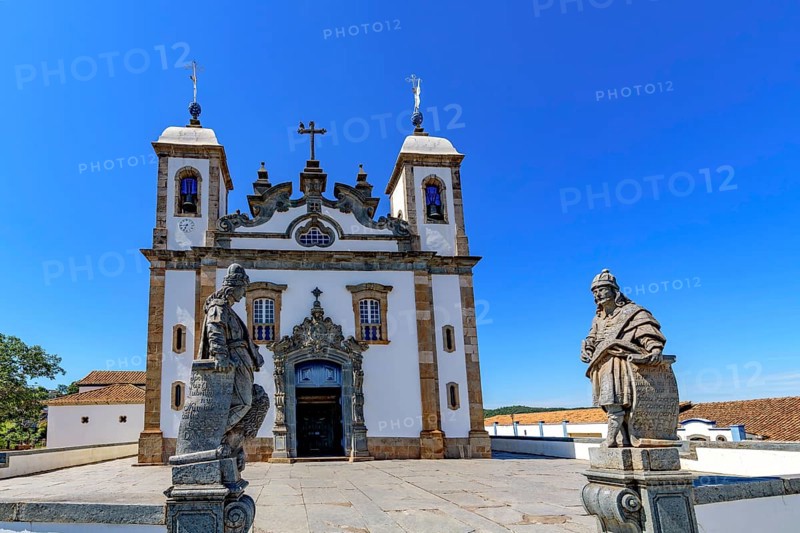 Front view of main church of the Bom Jesus do Matosinhos sanctuary with the prophets by Aleijadinho in the city of Congonhas, Congonhas, Minas Gerais, Brazil