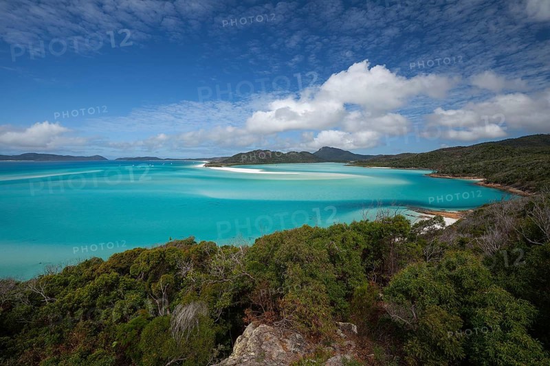 Sunny daytime view from Hill Inlet lookout over Whitehaven Beach, Whitsunday Island, Queensland, Australia