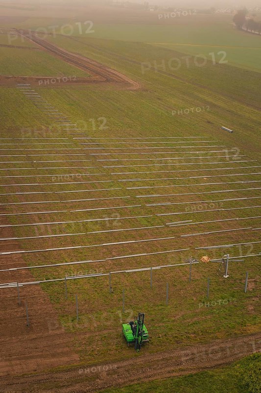 Prepared fields for solar plant construction, green environment, machine operation for installation, energy transition, construction of PV open space, Baden-Württemberg, Germany
