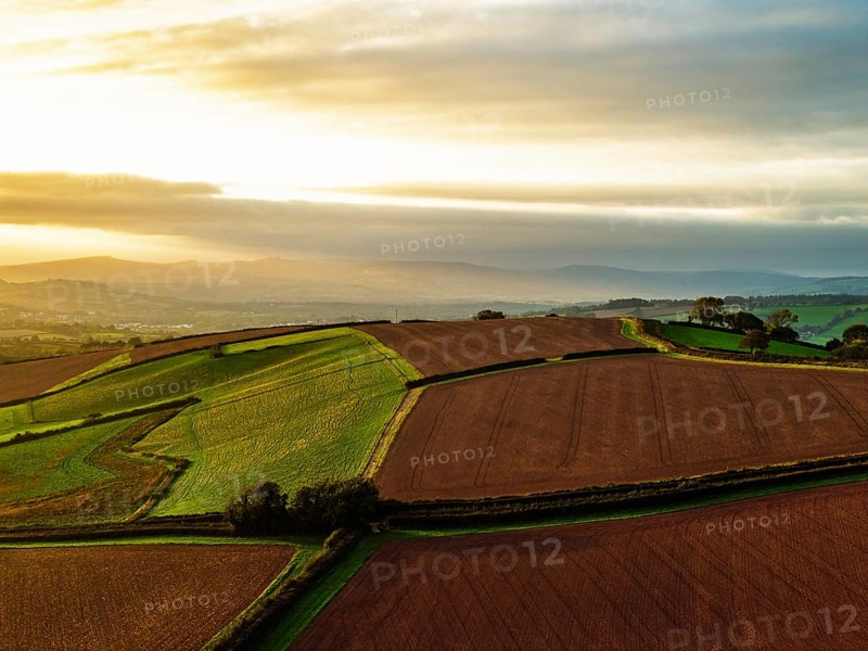 Colours of autumn Fields and Farms over Sheldon from a drone, Torbay, Devon, England, United Kingdom