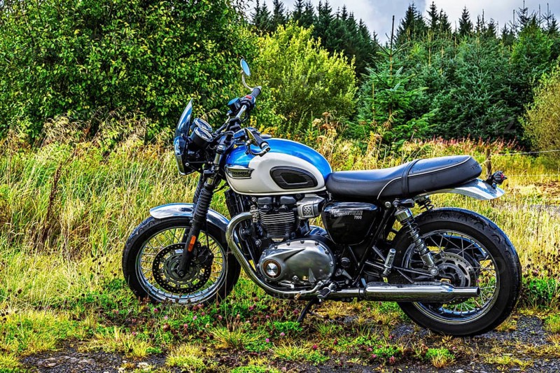 Triumph Motorcycle on the Scottish wilderness, Scotland, United Kingdom