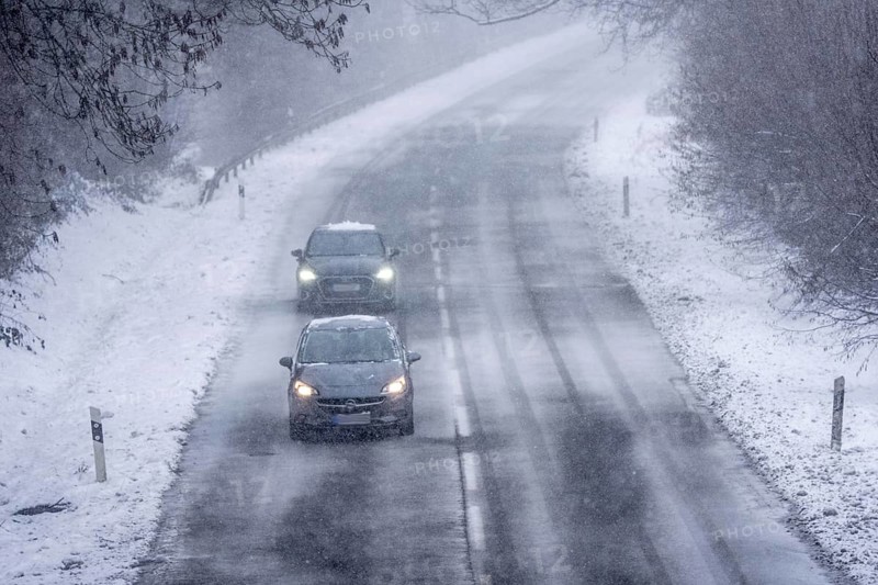 Country road in Elfringhauser Switzerland, near Sprockhövel, snowfall, snowy, North Rhine-Westphalia, Germany