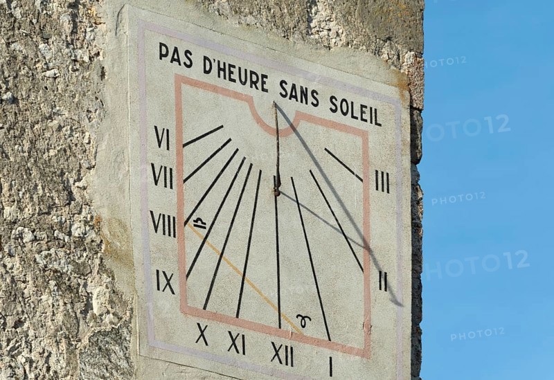 Charroux. Sundial on belfry. Allier department. Auvergne-Rhone-Alpes.France. Europe
