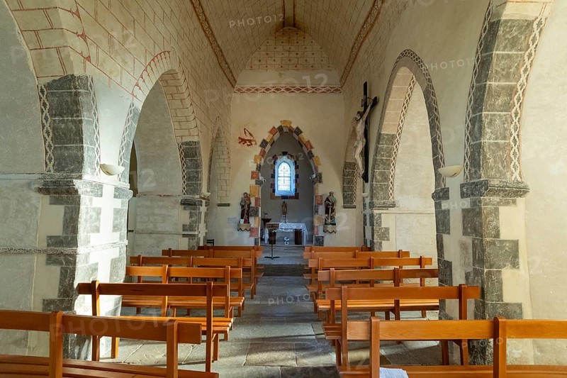 Painted church St Aignan's Church of Begues. Central nave flanked by two aisles. Allier department. Auvergne Rhone Alpes. France. Europe