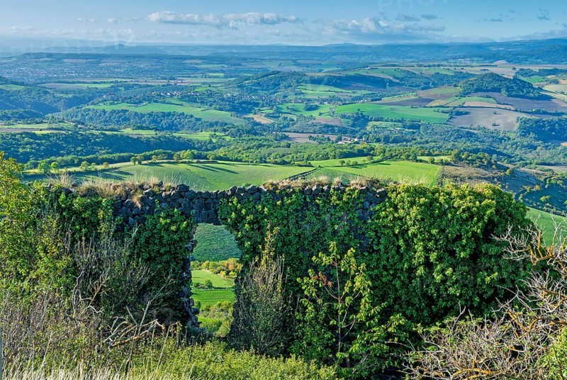Ruins of medieval castle of Buron on Limagne plain. Puy de Dome. Auvergne Rhone Alpes. France