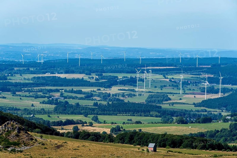 Wind turbines of Combrailles plateau near Bourg-Lastic. Puy de Dome. Auvergne Rhone Alpes. France