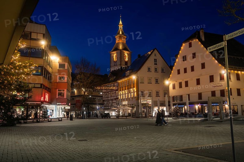 Urban square at night with illuminated half-timbered houses and church tower, Nagold, Calw district, Black Forest, Germany