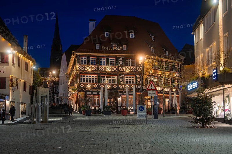 Night view of a traditionally designed half-timbered hotel in the city center, Nagold, Calw district, Black Forest, Germany
