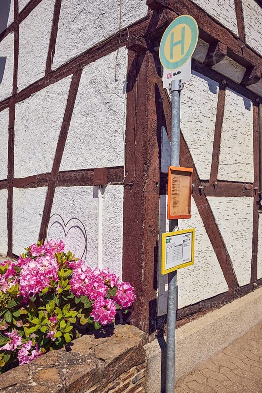 Bus stop Insul Gasthaus Keuler, half-timbered house, facade, flower, sunny, Insul, Ahrweiler district, Rhineland-Palatinate, Germany
