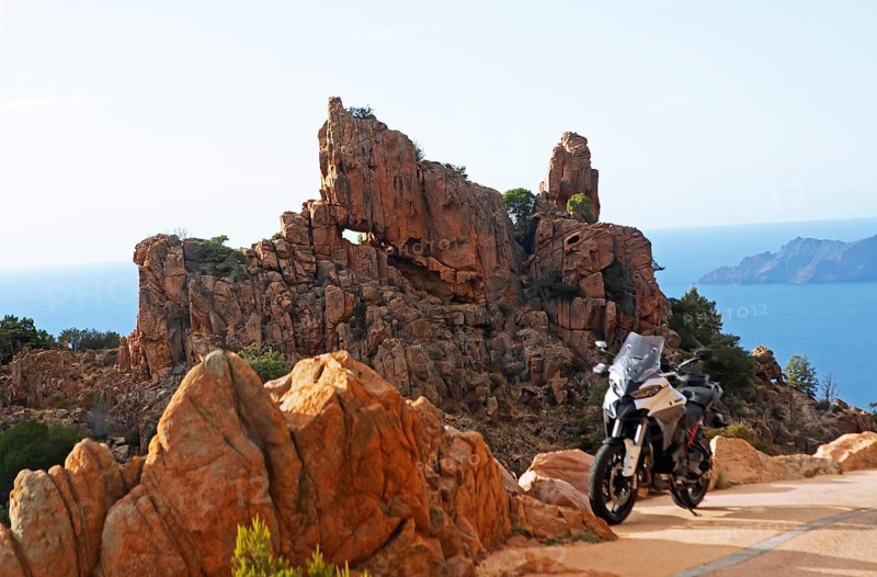 Bizarre rock erosions in evening light, Calanche, Les Calanches de Piana, Corse-du-Sud, Corsica, France