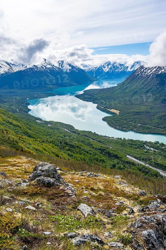 View of snowy mountains and turquoise lake Kenai Lake, Slaughter Ridge Trail, Cooper Landing, Kenai Peninsula, Alaska, USA