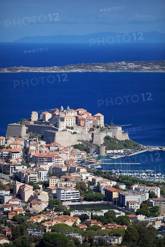 View of Calvi Citadel and Calvi Bay, in the background Cap Corse, Haute-Corse Department, Balagne, Corsica, France