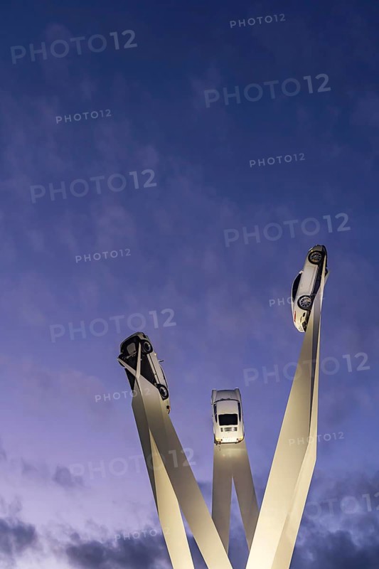 Inspiration 911 artwork by Gerry Judah in front of the Porsche headquarters on Porscheplatz: three steles, each presenting a Porsche 911 at a height of up to 24 meters. Stuttgart, Baden-Württemberg, Germany