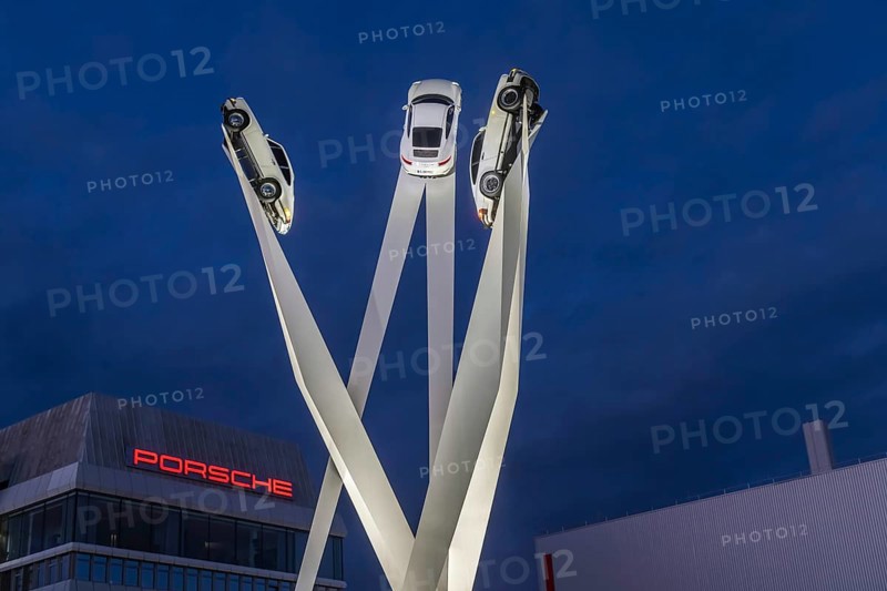 Inspiration 911 artwork by Gerry Judah in front of the Porsche headquarters on Porscheplatz: three steles, each presenting a Porsche 911 at a height of up to 24 meters. Stuttgart, Baden-Württemberg, Germany