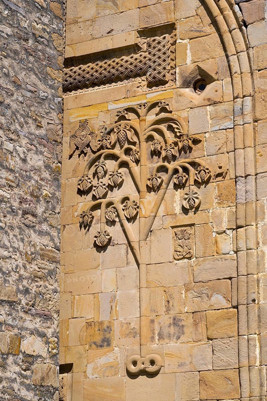 Detail of a historic building with a sandstone tree relief decorated with leaves, Ananuri Castle, Zhinvali Reservoir, Jinvali or Shinvali, Mtskheta-Mtianeti Region, Georgian Military Road, Georgia