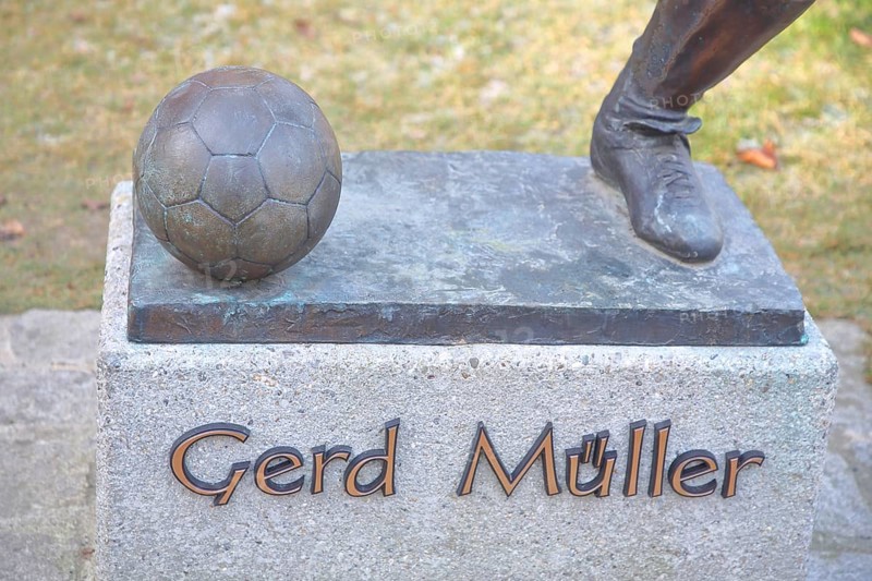 Memorial to soccer player Gerd Müller, German national team player, soccer legend, bronze sculpture, detail, inscription, Gerd-Müller-Platz, Nördlingen, Bavaria, Germany