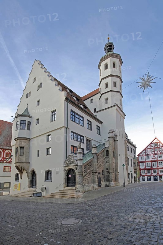 Town Hall built 1500, Renaissance Christmas star as Christmas decoration marketplace, Nördlingen, Bavaria, Germany