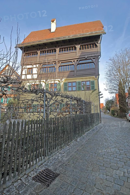 Historic half-timbered house with wooden fence, Mittlere Gerbergasse, Nördlingen, Bavaria, Germany