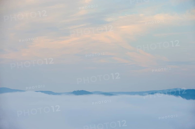 Early fog low-lying clouds in low mountain ranges, Germany