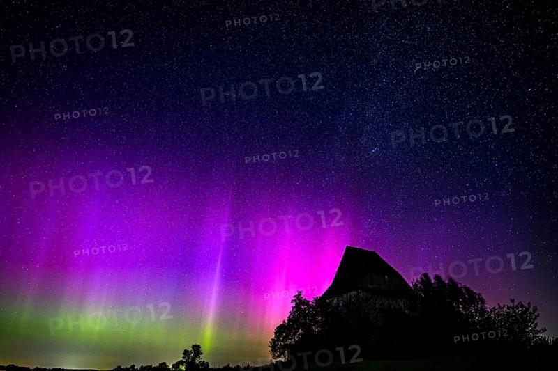 Colourful polar lights over the EXPO observatory in front of a starry night, EXPO Observatory, Oberholsten, Melle, Lower Saxony, Germany
