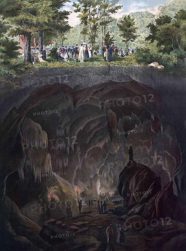 Nebelhöhle, a stalactite cave in the Swabian Jura in Baden-Württemberg, with spring festival, Swabia, Germany, interior view of a cave with stalactites and people exploring them, authentic reproduction of a school mural, historic, around 1900