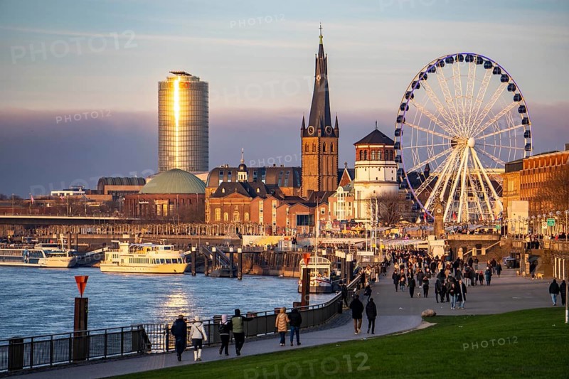 Rhine promenade in Düsseldorf, Ferris wheel, old castle tower, St. Lambert Basilica, old town, ERGO Insurance high-rise building, North Rhine-Westphalia, Germany