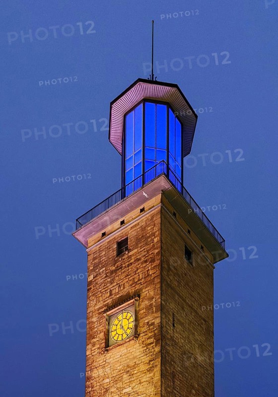 The illuminated and illuminated town hall tower in the evening, Hagen, Ruhr area, North Rhine-Westphalia, Germany