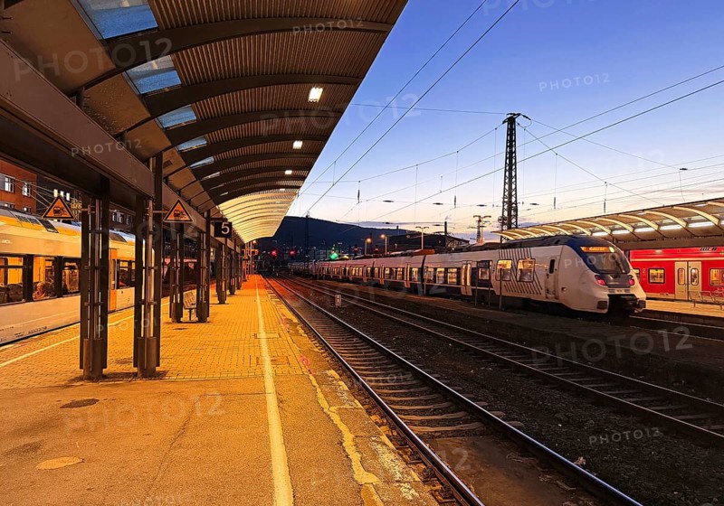 Deserted platform with regional express in the evening, central railway station, Hagen, North Rhine-Westphalia, Germany