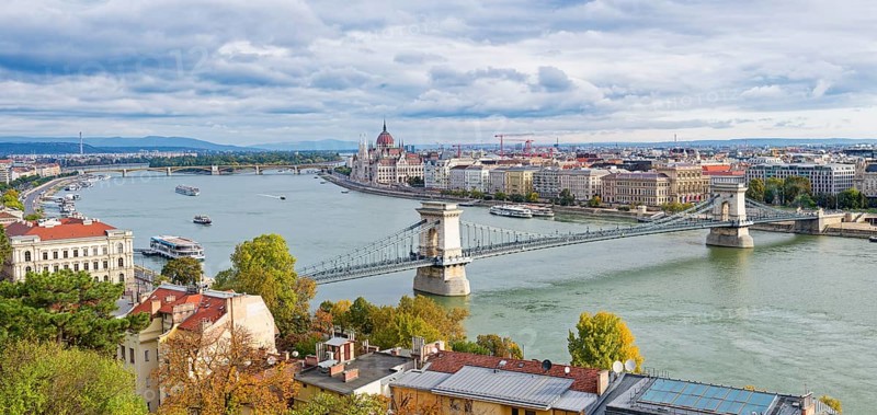 Hungarian parliament along the Danube River and Chain Bridge, Budapest, Hungary
