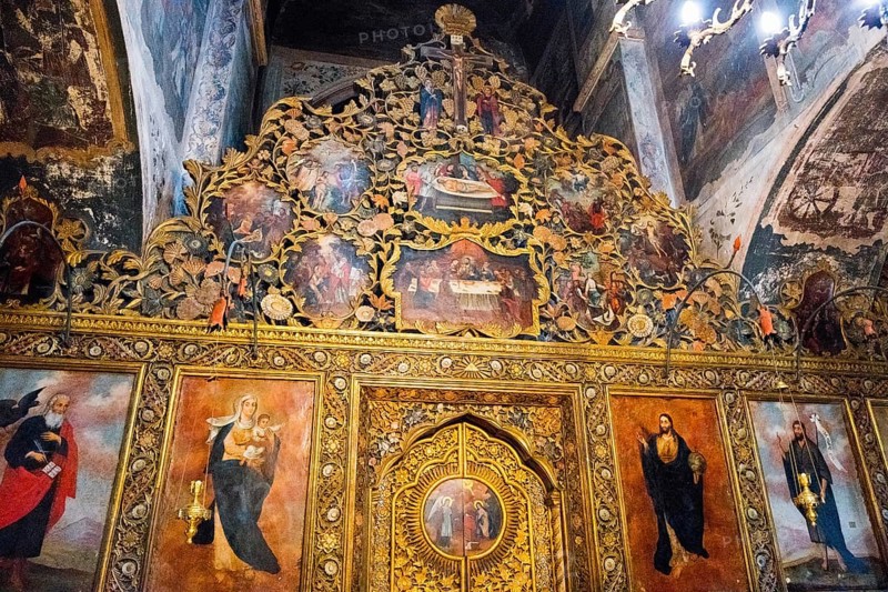 Artistically decorated icon wall with golden elements and religious representations in a church, Bodbe monastery, Sighnaghi, Signagi, Kakheti province, Greater Caucasus, Georgia, Western Asia
