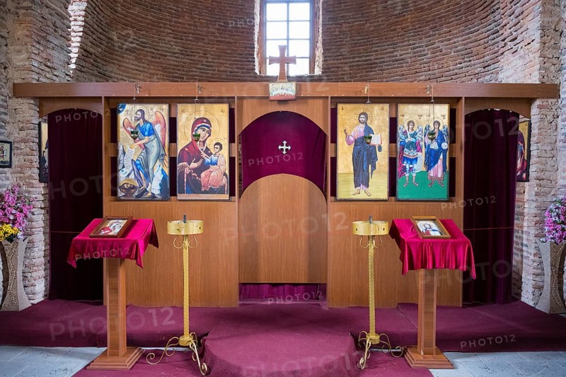 Orthodox iconostasis with richly decorated icons and cross, intricately crafted wood, church, Batonis Ziche fortress, Telavi, Kakheti region, Georgia