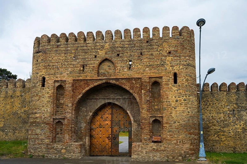 Historic fortress with high archway and massive stone walls, medieval charm, entrance gate, Batonis Ziche fortress, Telavi, Kakheti region, Georgia