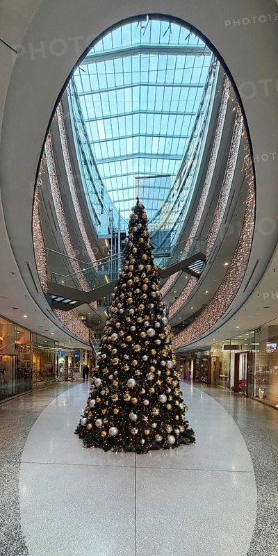 Stilwerk Düsseldorf, interior view, Christmassy decorated elliptical atrium with surrounding galleries in five sales floors, Germany