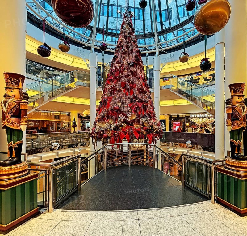 Schadow arcades, elegant shopping center with Christmas decorations and a large Christmas tree spread over several floors, Düsseldorf, Germany