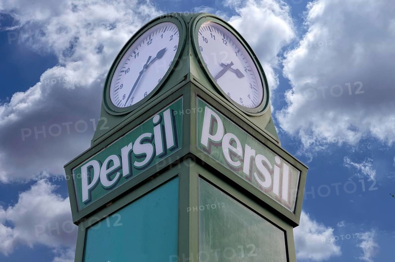 Detail of the persimmons clock, neon sign for the Henkel company, this historic persimmon clock was given away to cities in the 1920s, Fürth, Middle Franconia, Bavaria, Germany