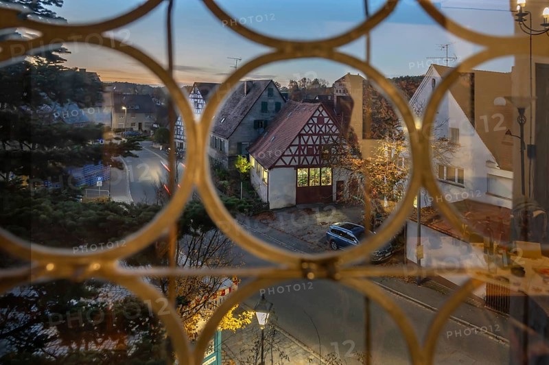 View from the castle window of the evening Neunhof near Lauf an der Pegnitz, Middle Franconia, Bavaria, Germany