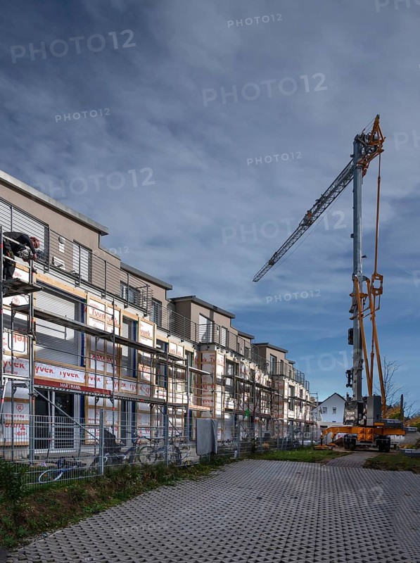 Thermal insulation is being installed on a residential block, Eckental, Mittelfranken, Bavaria, Germany