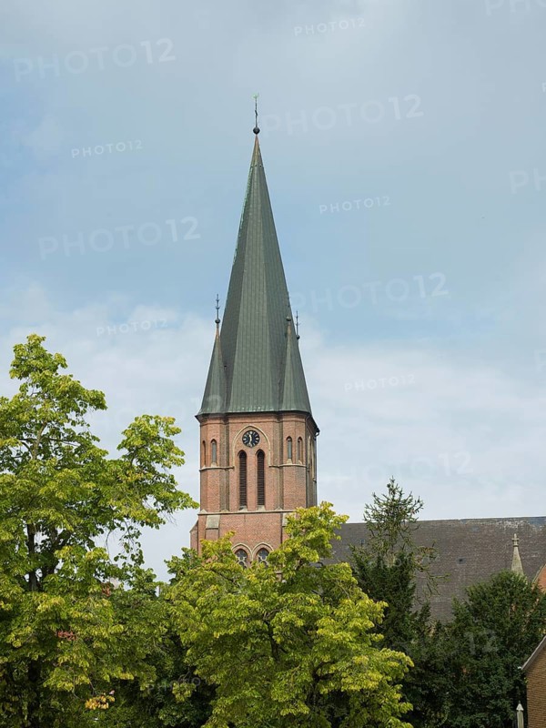 The mighty church spire, St. Anthony's Church, Papenburg, Emsland, Lower Saxony, Germany