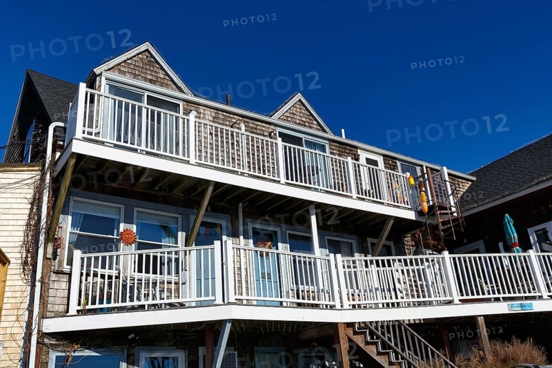 Typical architecture, wooden shingles, white railings, decks, outdoor stairs, Bearskin Neck, Rockport, Cape Ann, Massachussets, New England, USA