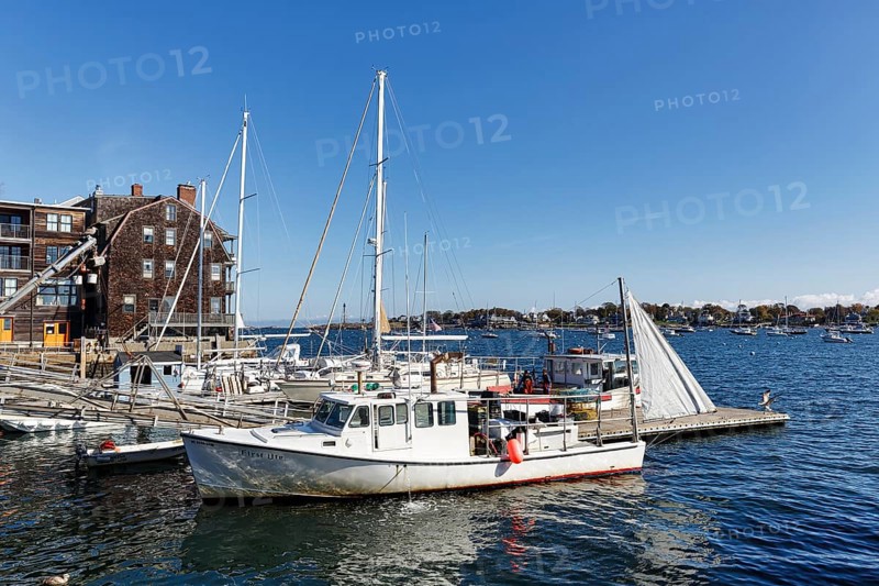 Scenic backdrop, sailboats and historic buildings with shingle façade in harbor, Rockport, Cape Ann, Massachussets, New England, USA