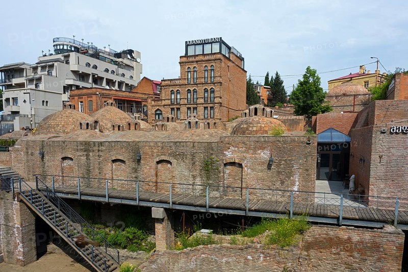 Historic brick buildings with domes in urban surroundings, sulfur baths, Abanotubani spa district, old town, Tbilisi, Tbilisi, Georgia