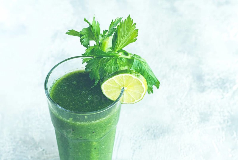 Glass with green smoothie, celery and spinach, apple and kiwi, cucumber, vegetable smoothie, breakfast, homemade, no people
