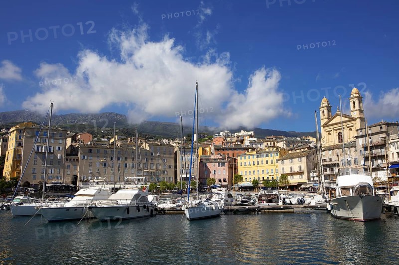 Old port with marina and church of Saint Jean-Baptiste à Bastia or church of St. John the Baptist, Port de Plaisance or Vieux Port, old town, Bastia, Haute-Corse department, Corsica, France
