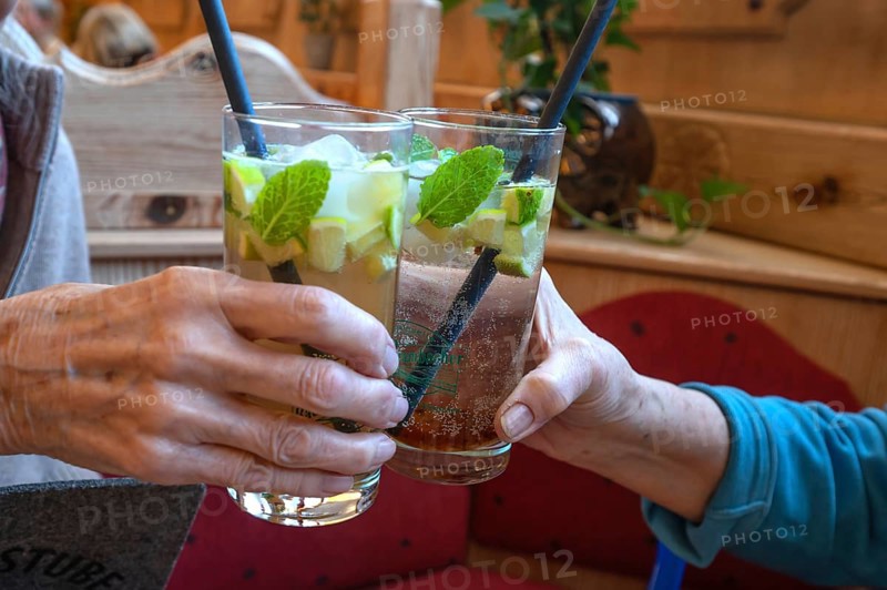 Toasting health with cocktails, Bavaria, Germany