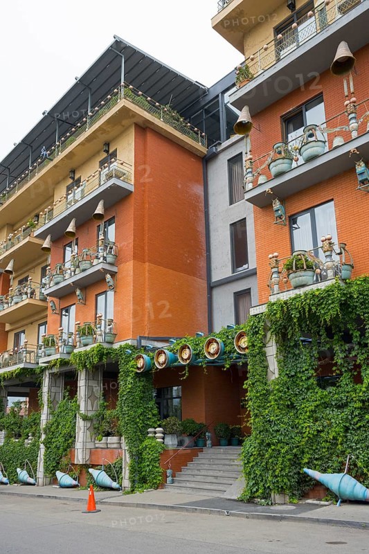Multi-storey residential building with colorful facades, balconies and lots of greenery, Brim Hotel, Tbilisi, Tbilisi, Georgia
