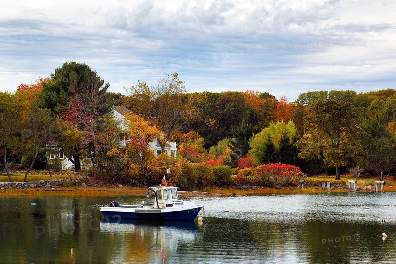 Scenic river landscape, lobster boat, riverbank fishing boat, autumn leaves, Indian summer, Kennebunk River, Maine, New England, USA