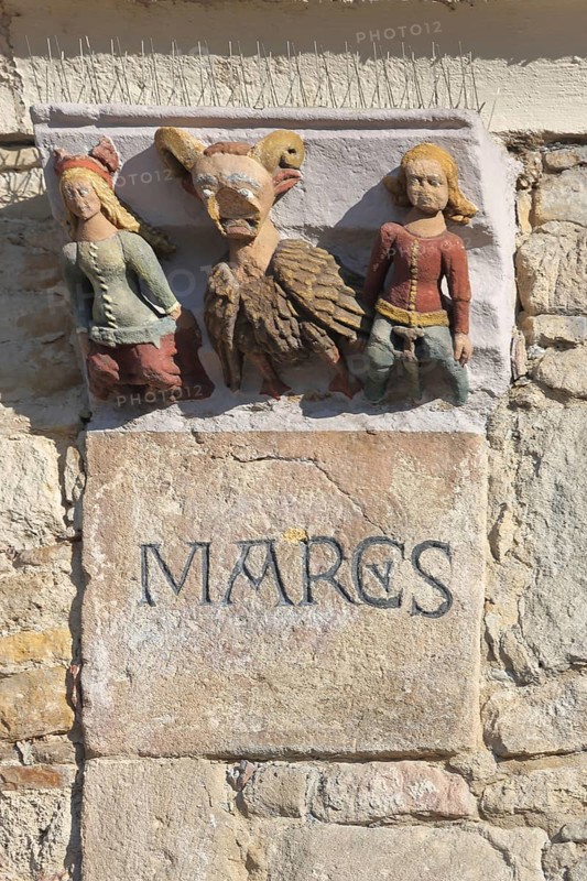 Historical pillory painting with three medieval figures, pillory, grimaces, envy heads, detail, hospital courtyard, market square, Reutlingen, Swabian Jura, Baden-Württemberg, Germany