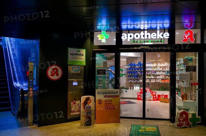 Night view, pharmacy city center, logo, underpass, escalator, neon light, illuminated, Stuttgart, Baden-Württemberg, Germany