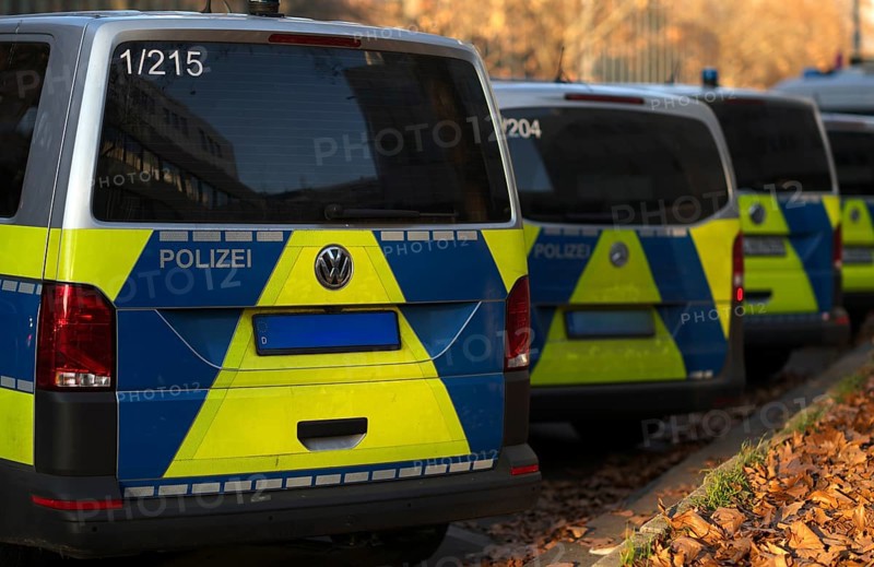 Various police vehicles, police cars, police vans, from behind, parked, Stuttgart, Baden-Württemberg, Germany